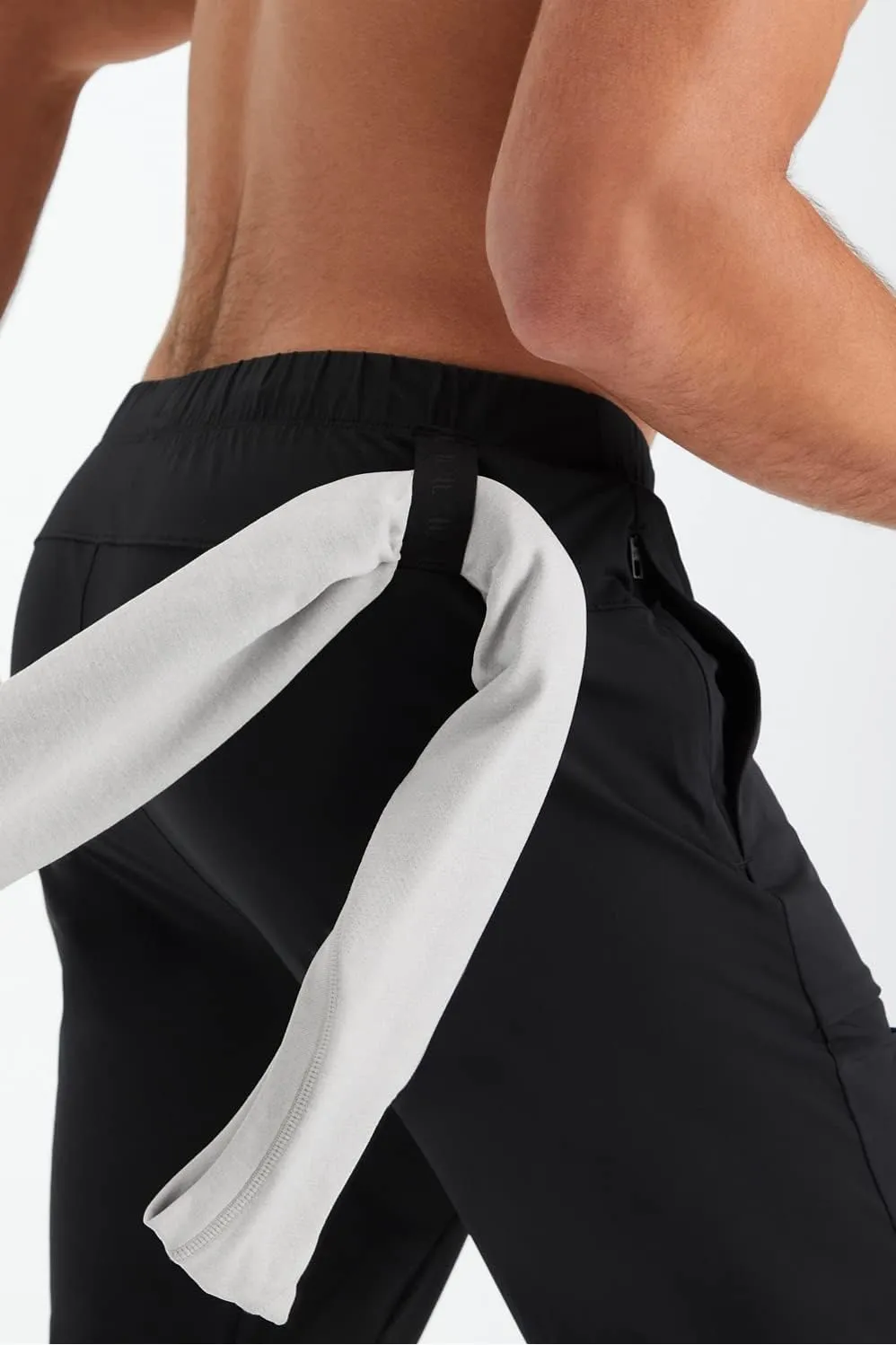 Fabletics Men's The One Jogger, Quick-Dry, Hidden Pockets, Zip Pockets, UPF Protection, Anti-Stink, Lightweight